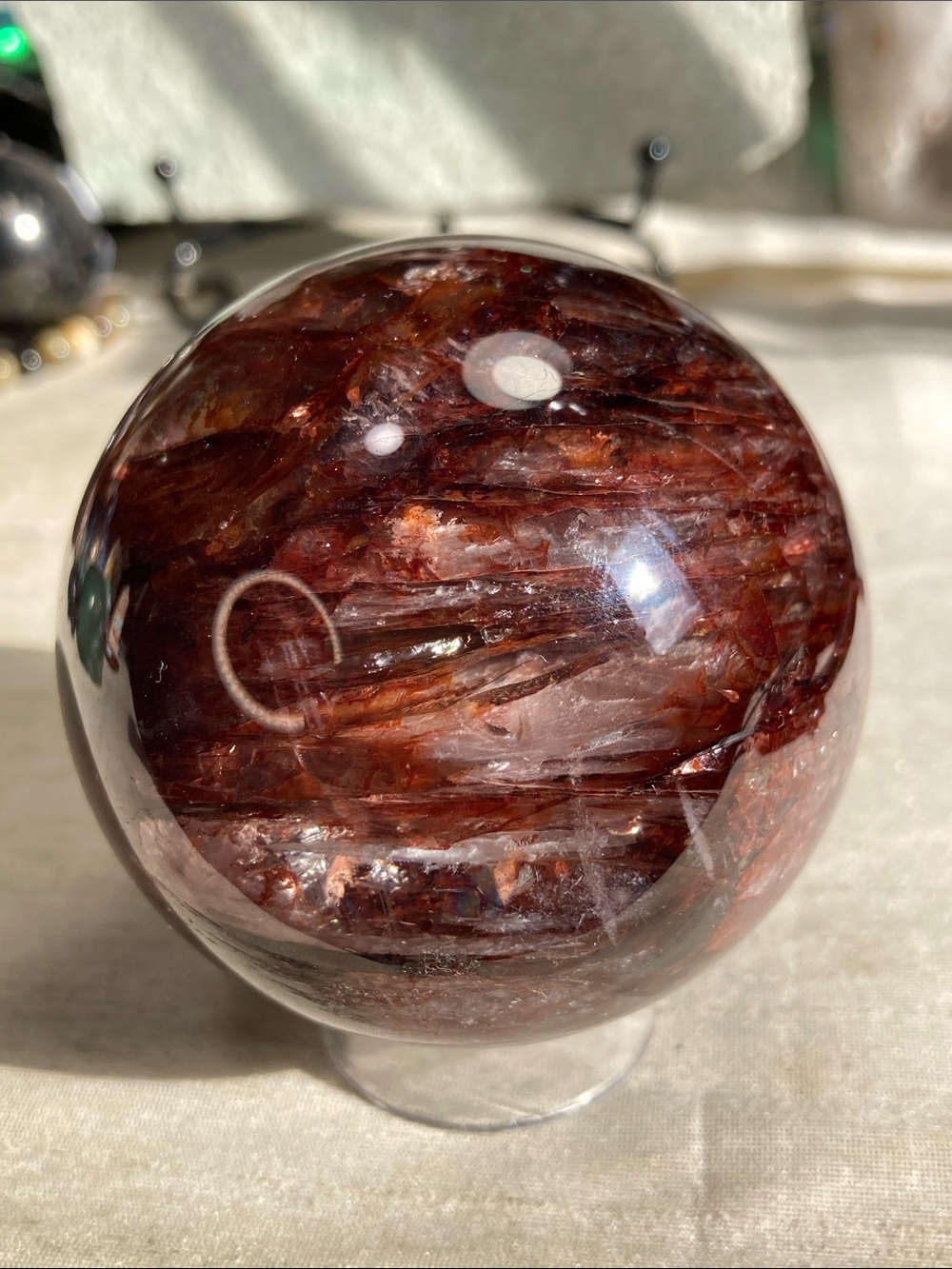 Extra quality fire quartz crystal sphere with quartz pockets/ windows